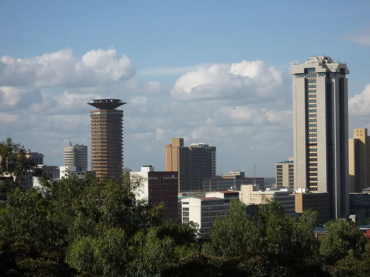 Nairobi's city-centre towers, including the Kenyatta International Convention Centre, rising above the trees